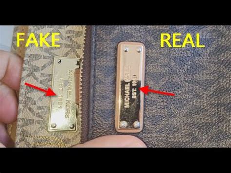 fake michael kors wallet vs real|is my michael kors purse real.